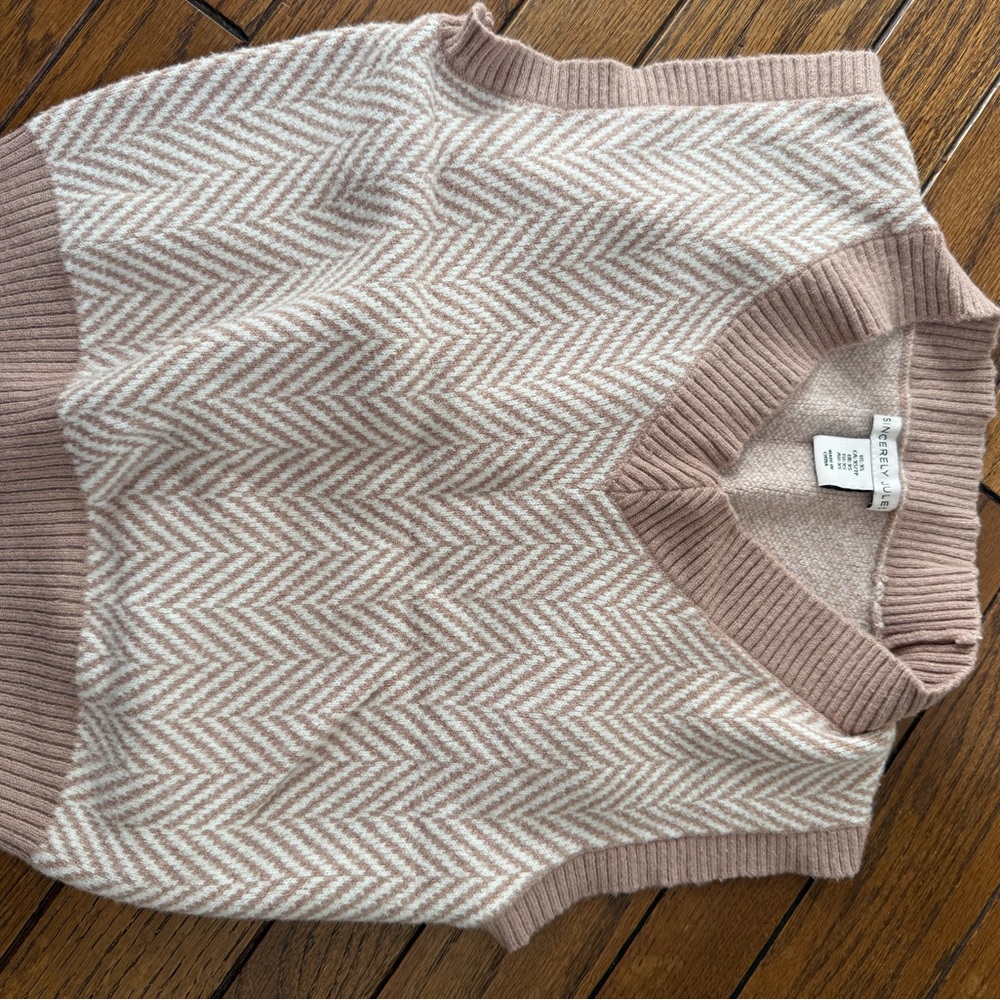 Cream and white sweater vest from Sincerely Jules